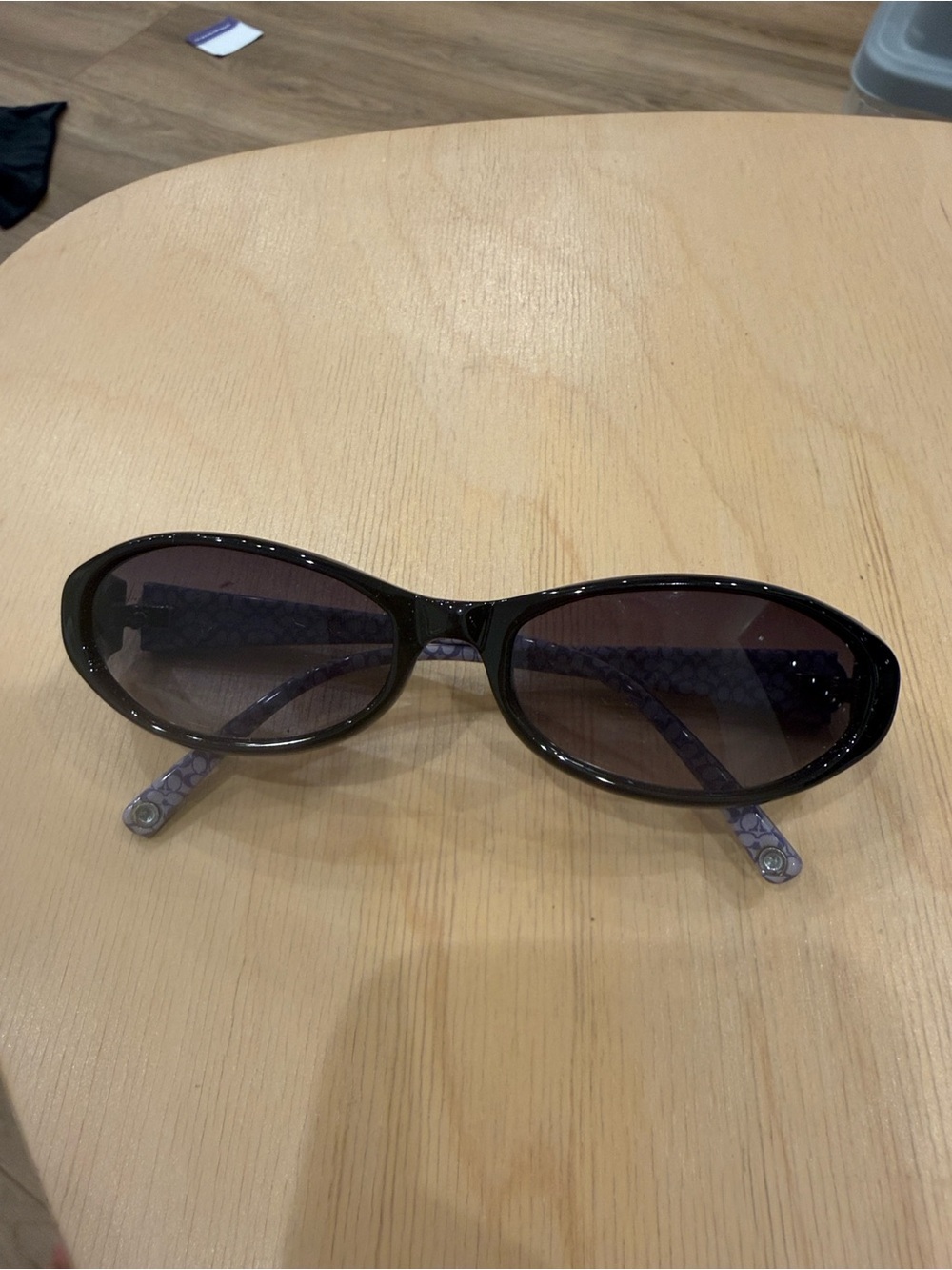 Coach Women's Oval Sunglasses in Black/purple